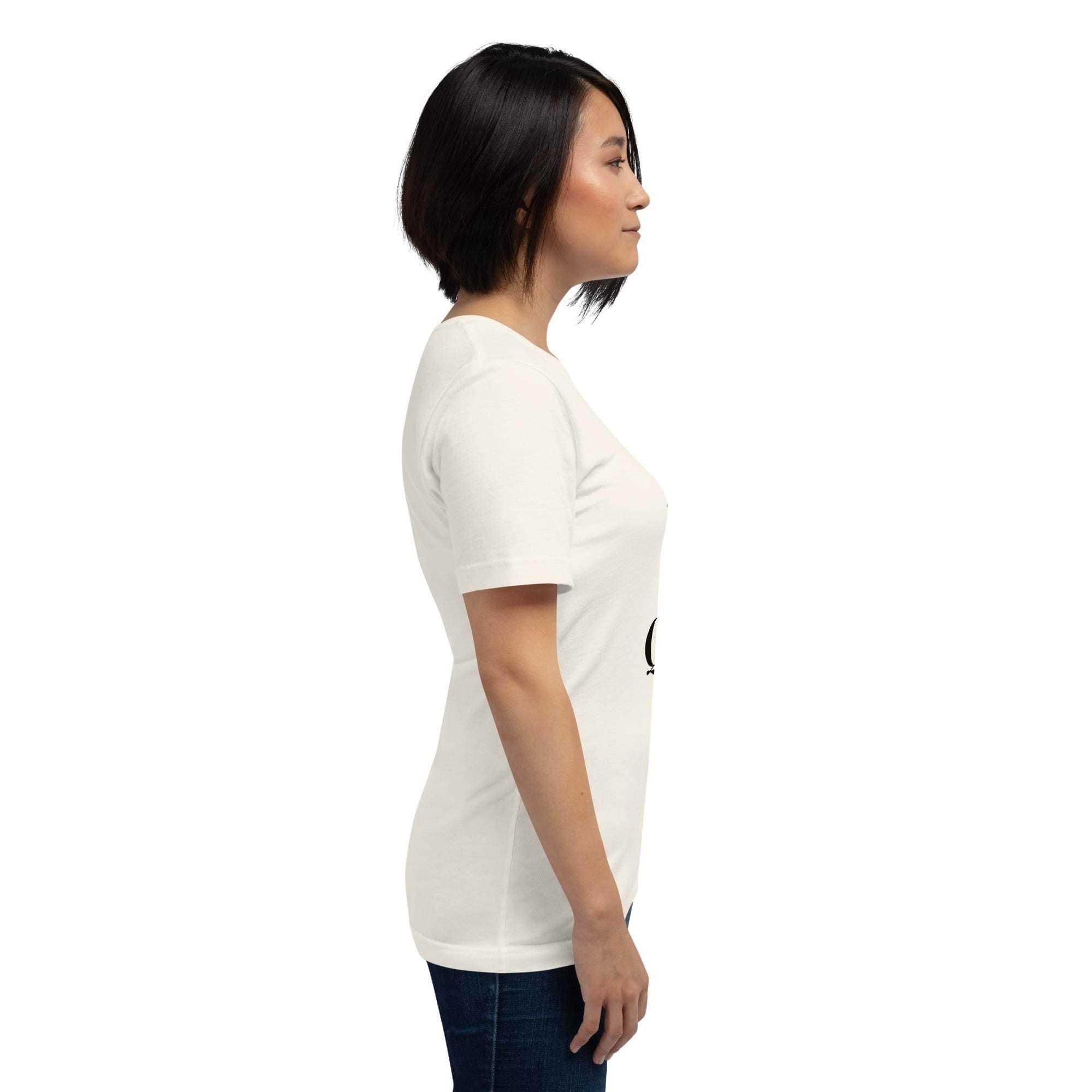 Side view of woman wearing white "I'm the Real Queen" T-Shirt with crown graphic and statement text