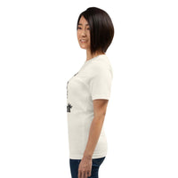 Woman wearing white "I'm the Real Queen" T-Shirt with crown graphic and confident statement text side view