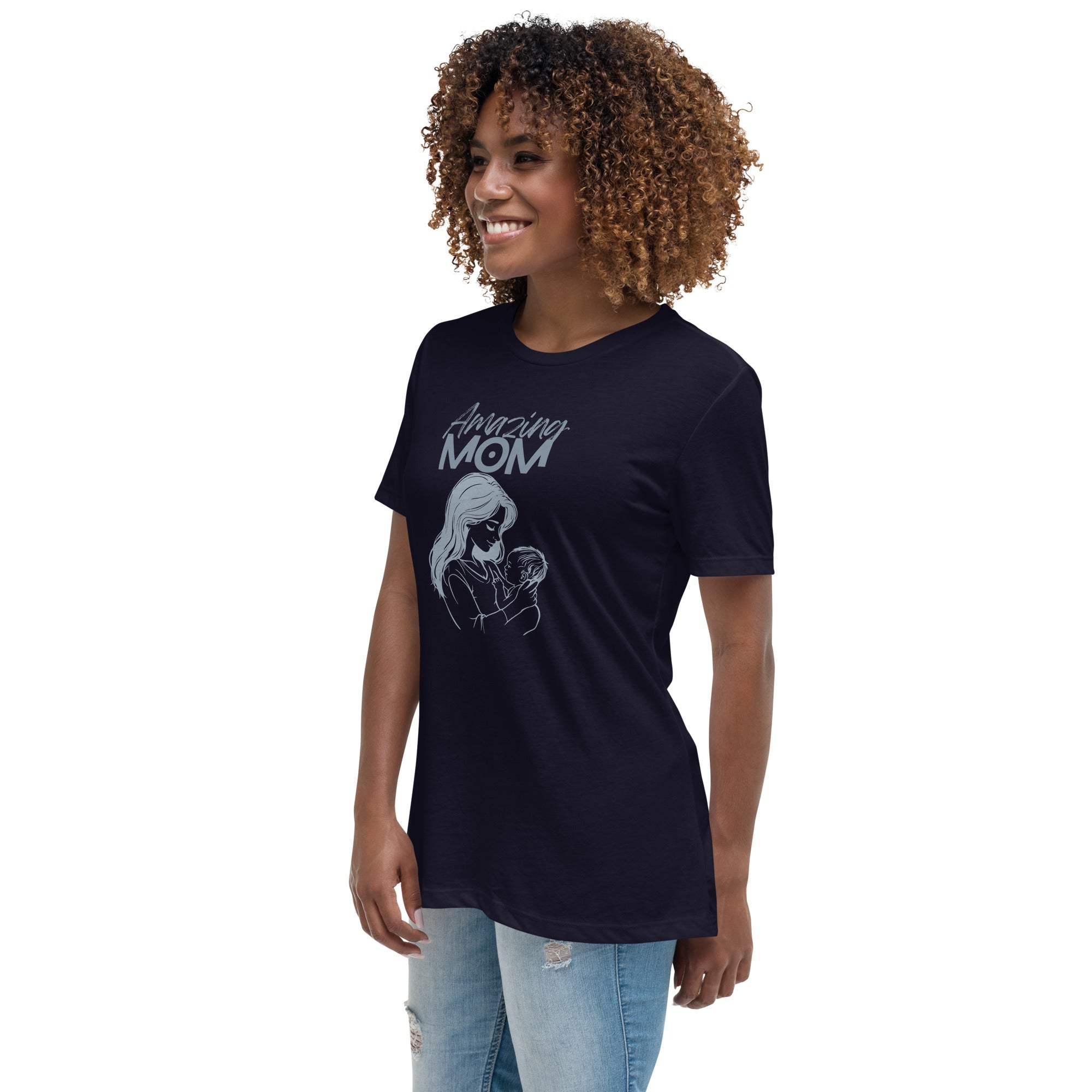 Woman wearing a navy Amazing Mom T-Shirt with a mother and baby graphic and text design
