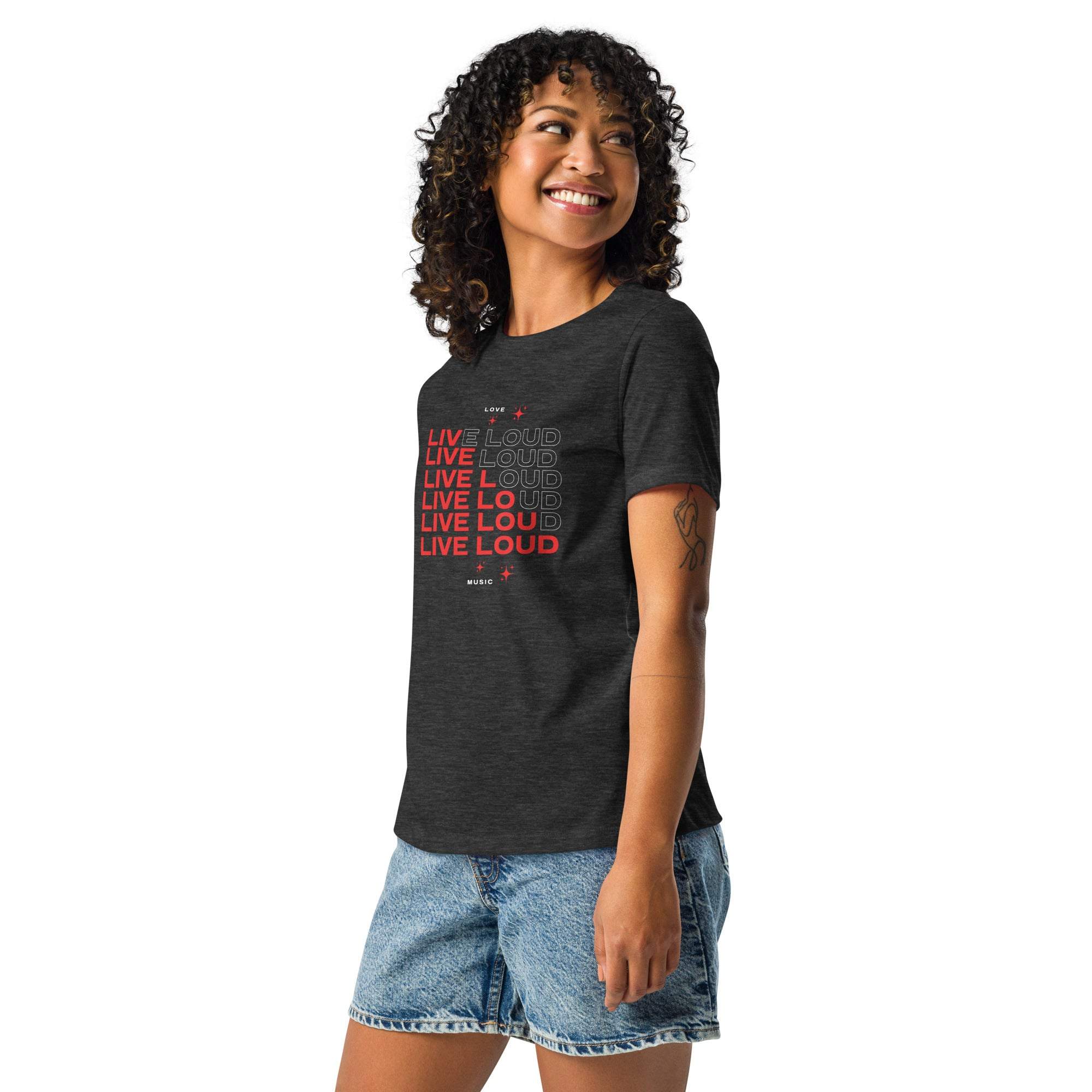 Young woman wearing black LIVE LOUD Music T-Shirt with red and white retro typography and graphic print