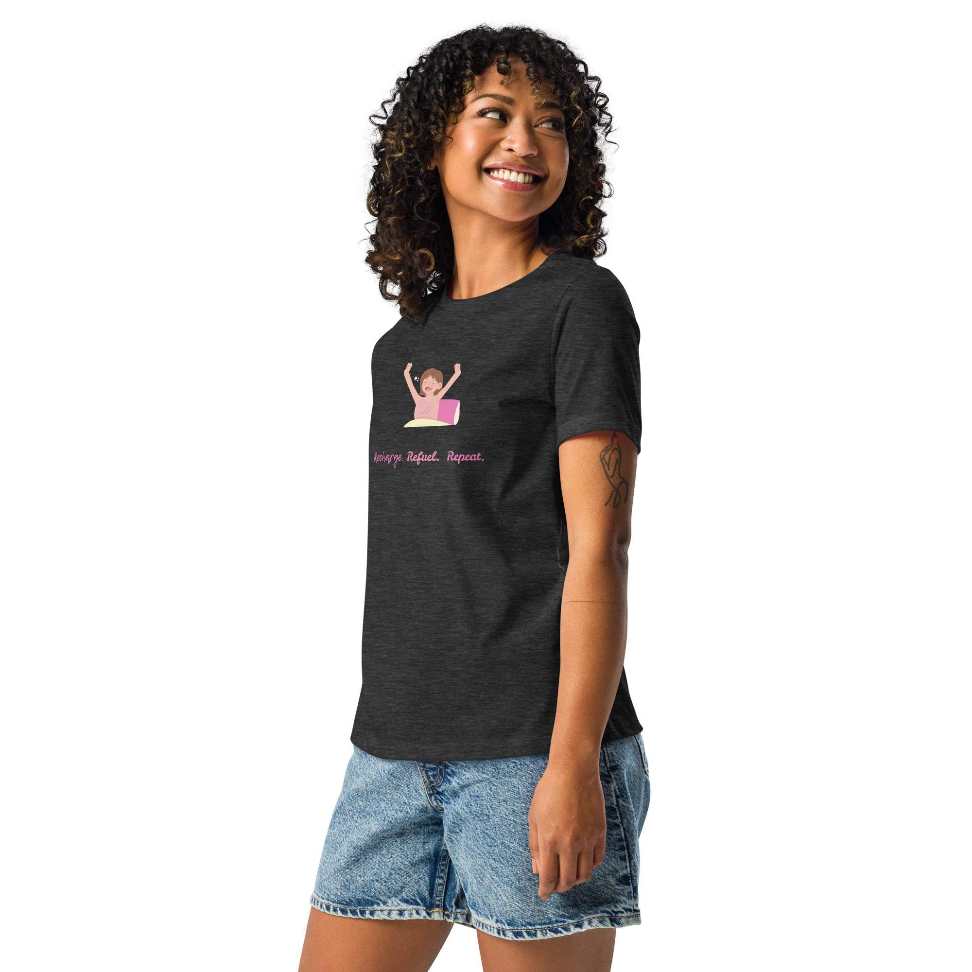 Woman wearing black Science Repeat Apparel T-Shirt with pink science-themed graphic and text, paired with denim shorts
