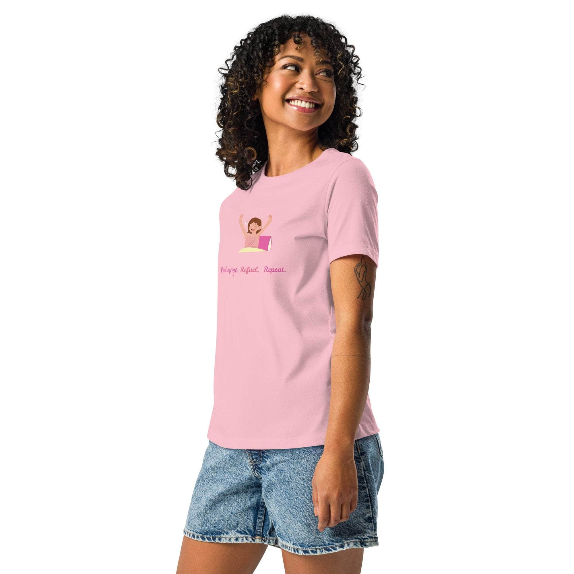 Woman wearing pink Science Repeat Apparel T-Shirt with a science-themed graphic and text, paired with denim shorts