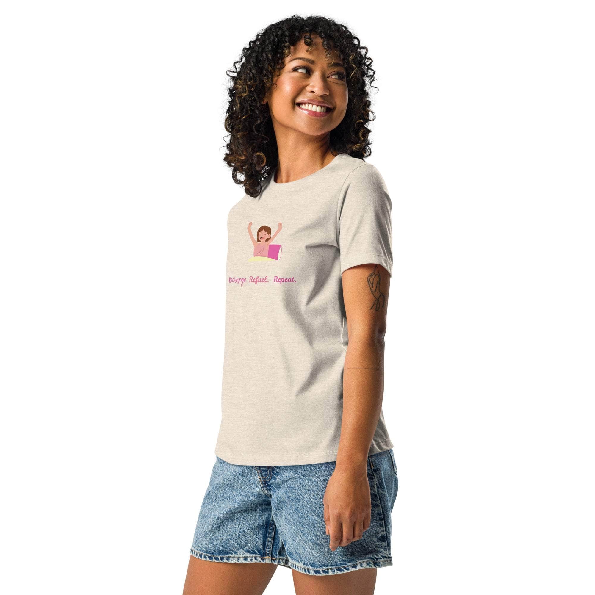 Woman wearing beige Science Repeat Apparel T-shirt with a fun science-themed graphic and denim shorts