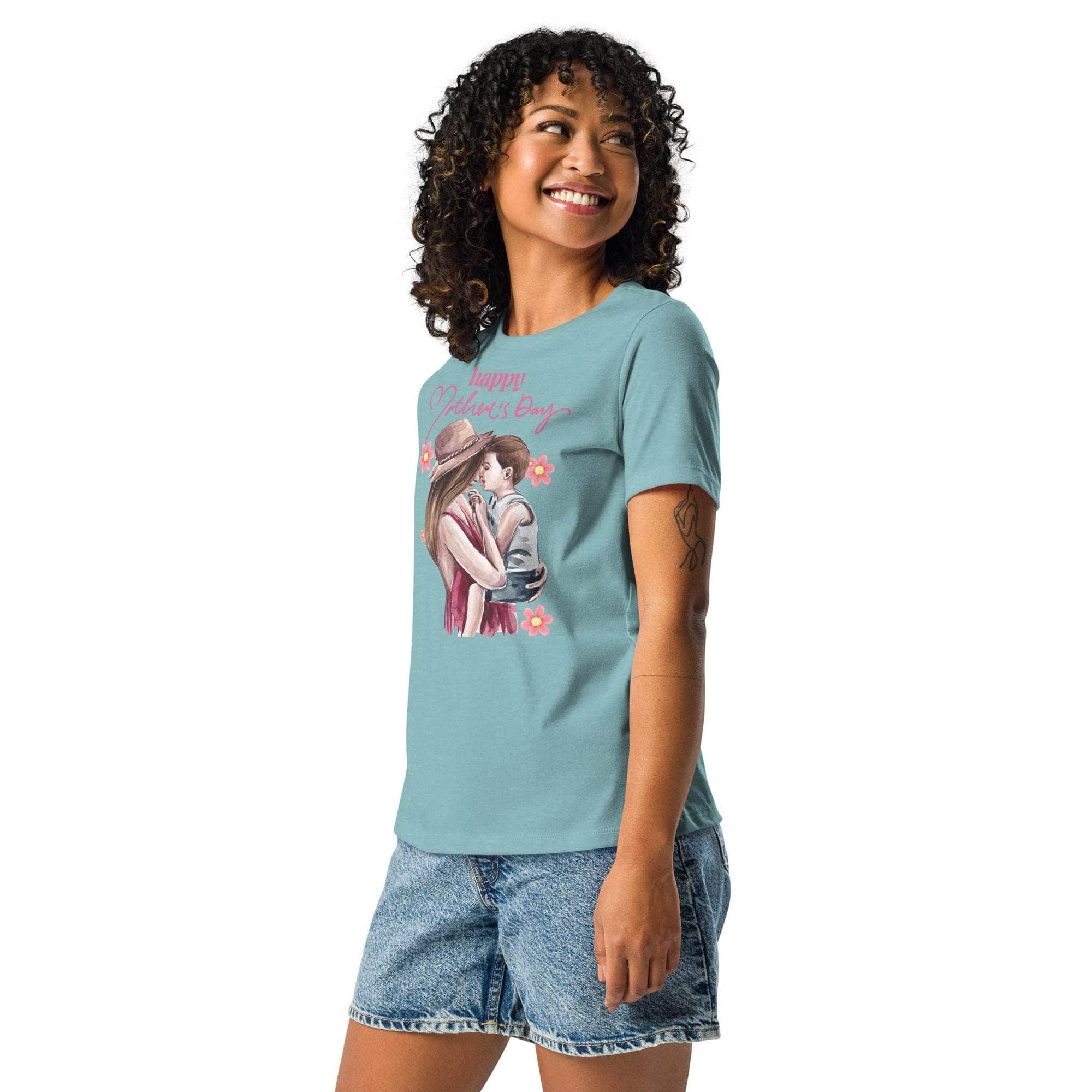 Woman wearing blue Mother's Day T-Shirt with mom and child graphic and floral accents