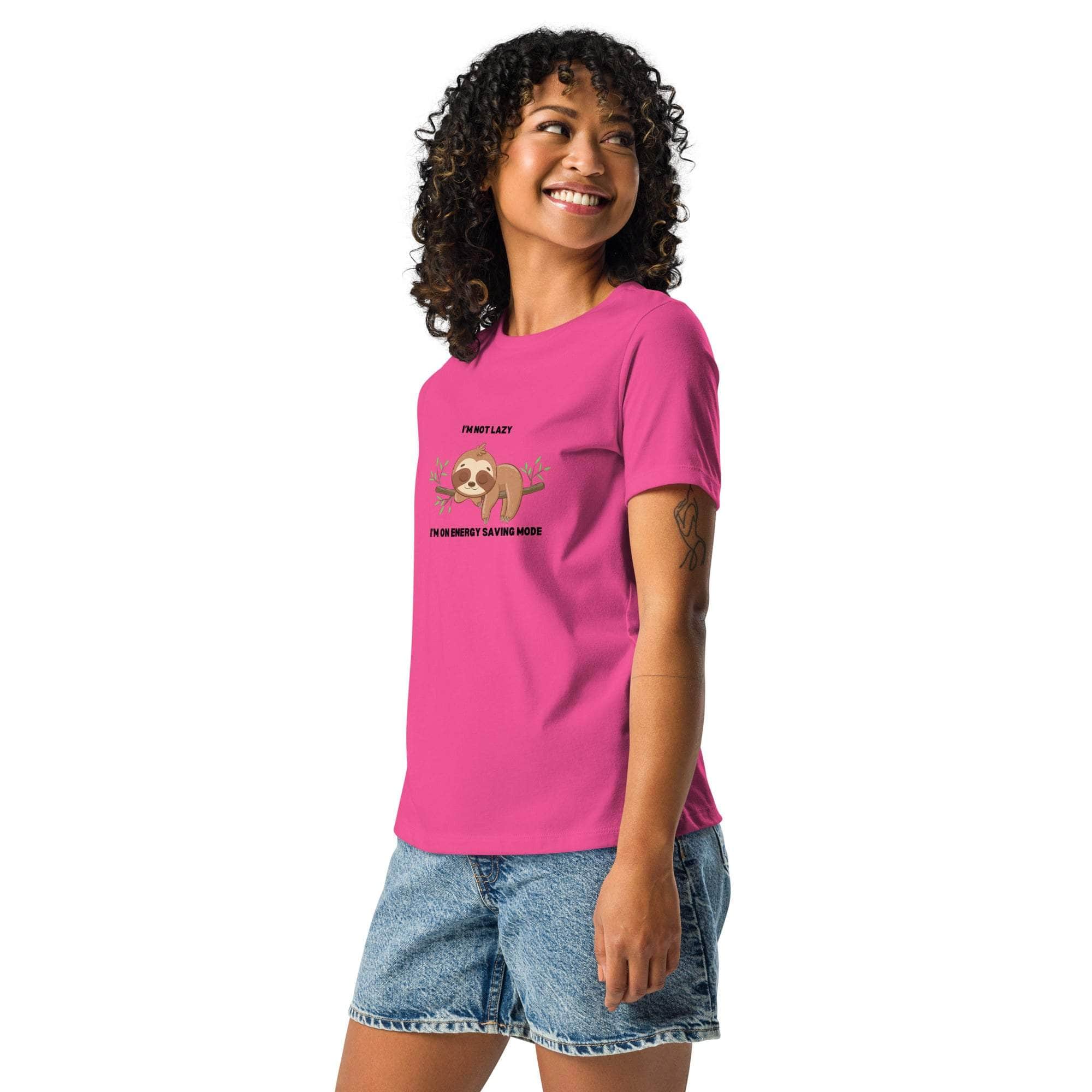 Woman wearing pink "I'm Not Lazy I'm On Energy Saving Mode" sloth graphic t-shirt with denim shorts