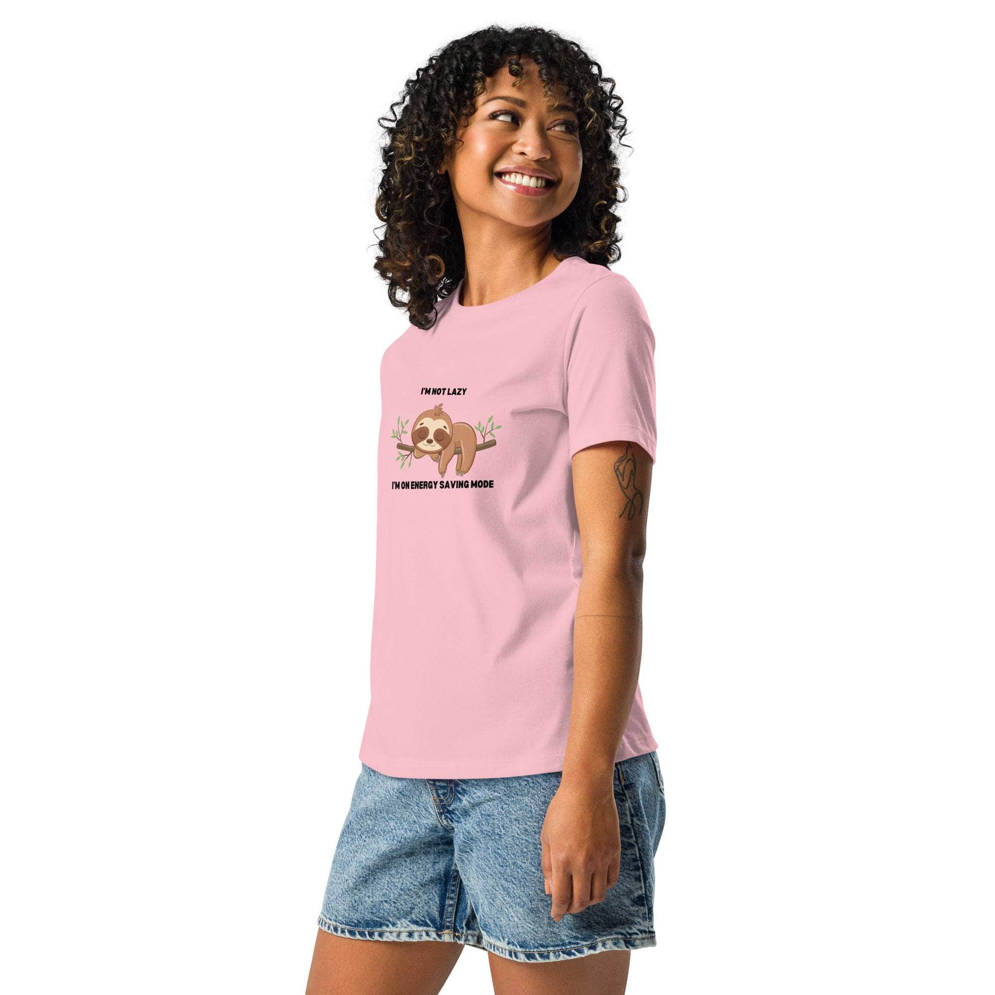 Woman wearing pink "I'm Not Lazy, I am On Energy Saving Mode" sloth graphic t-shirt with denim shorts