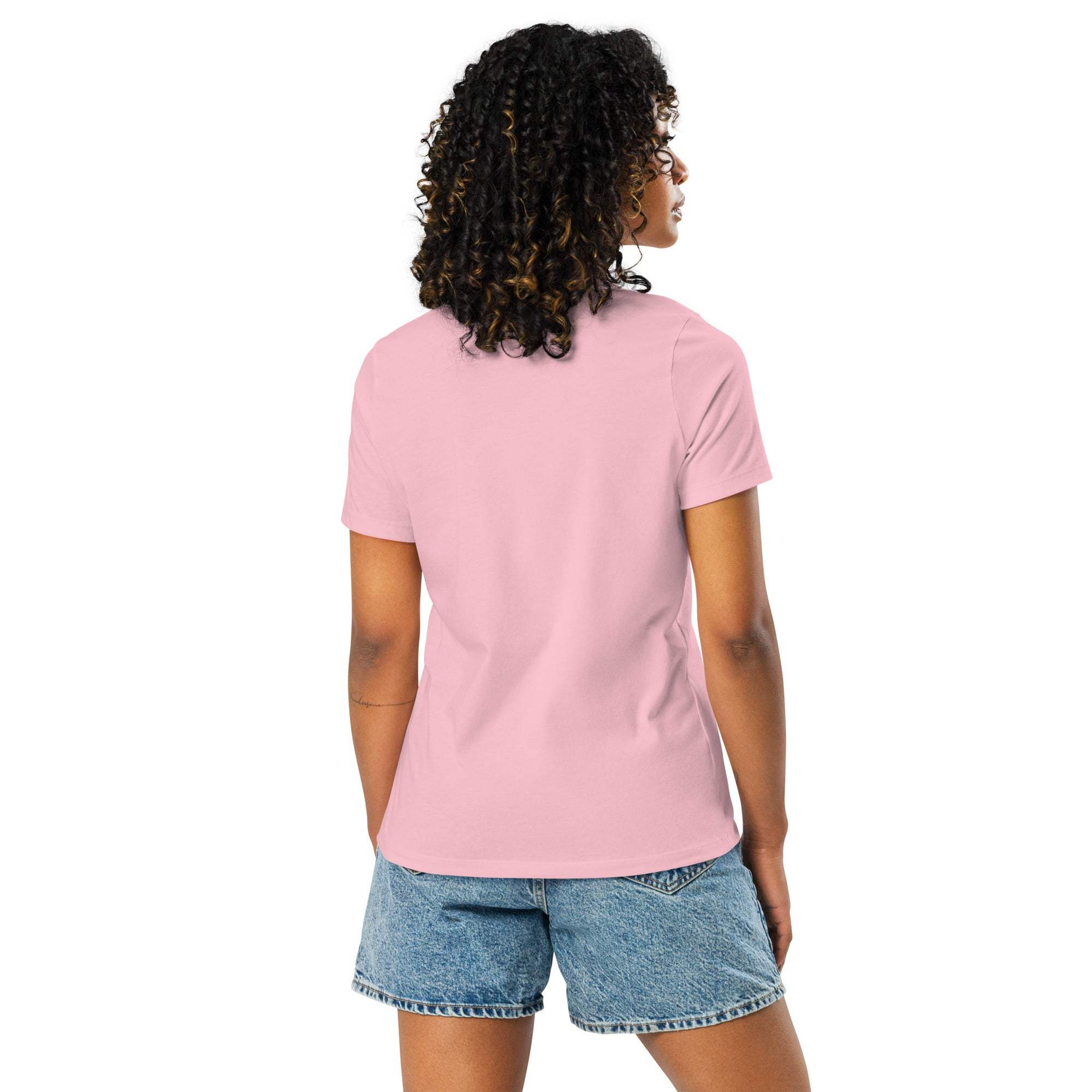 Woman wearing a pink "I'm Not Lazy, I am On Energy Saving Mode" sloth t-shirt and denim shorts, shown from the back