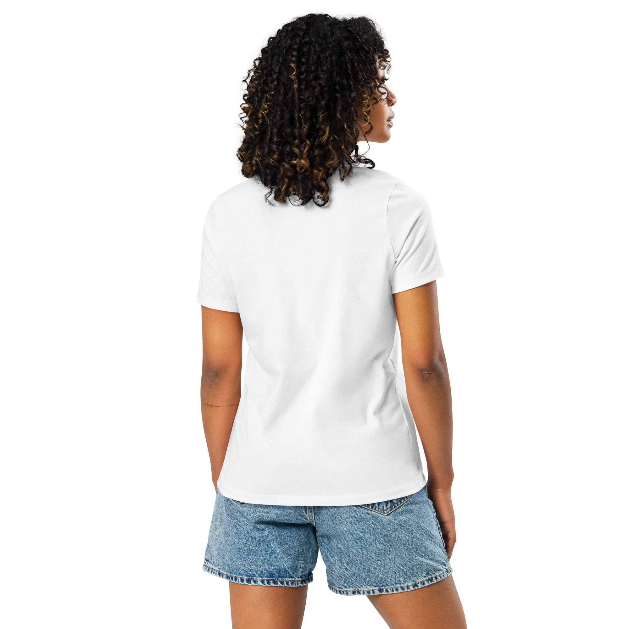 Woman wearing white "I'm Not Lazy, I am On Energy Saving Mode" sloth t-shirt and denim shorts, back view