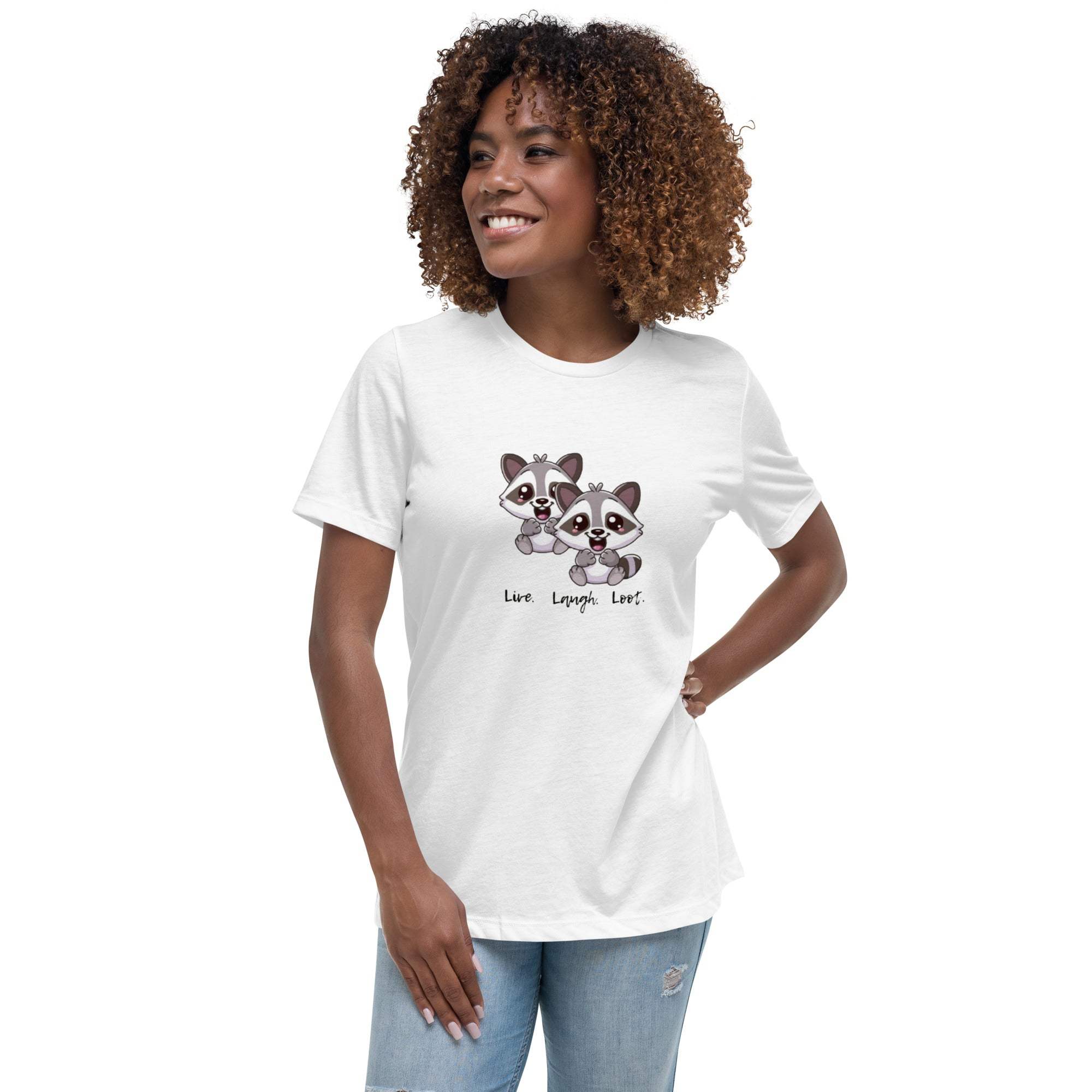 Woman wearing white Live Laugh Loot T-Shirt with cute raccoon graphic and text on front.