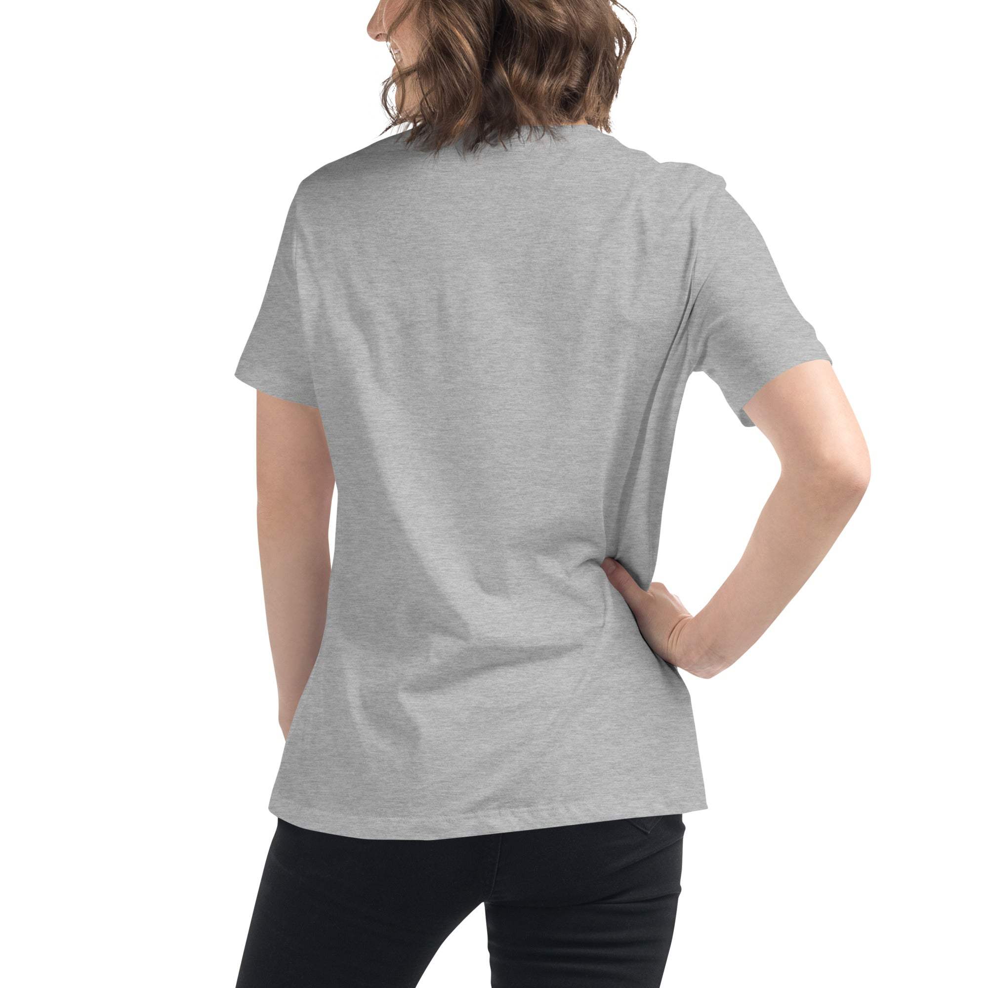 Woman wearing grey minimalist speechless face line art t-shirt shown from the back
