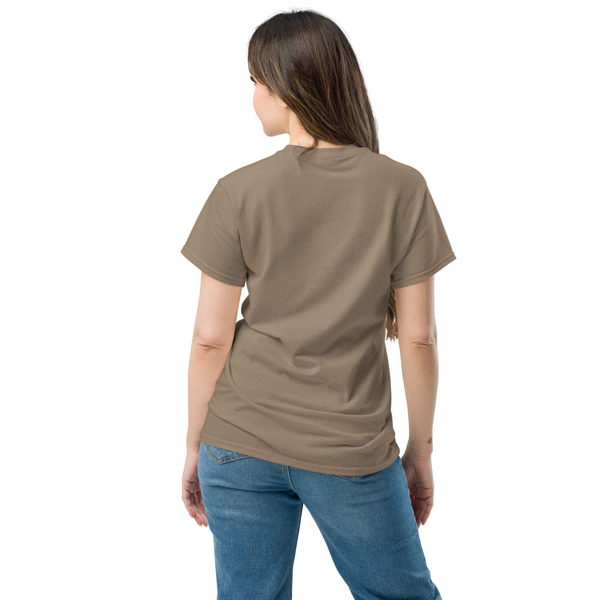 Woman wearing plain brown Christian Cross T-Shirt seen from the back with blue jeans