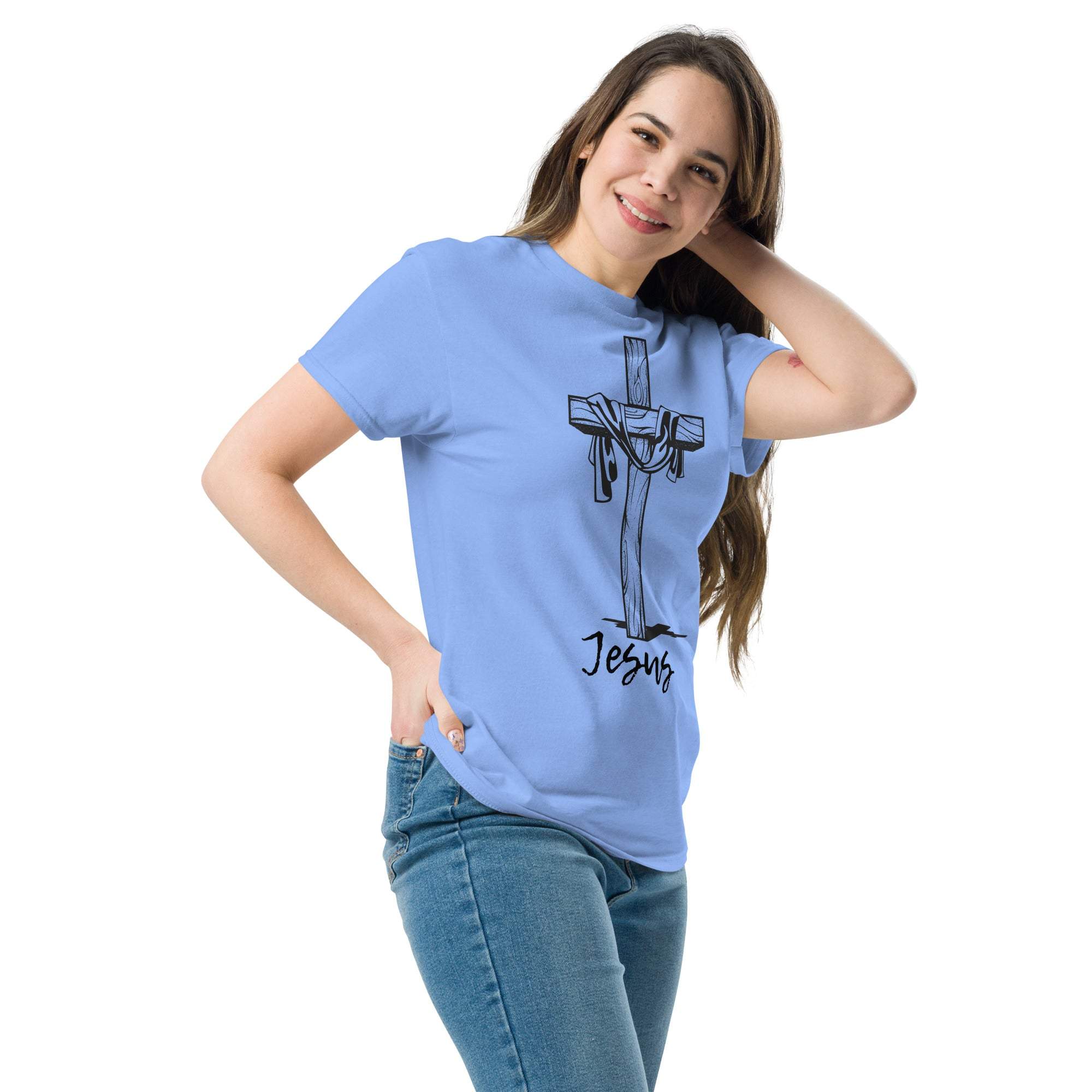 Woman wearing light blue Christian Cross T-Shirt with Jesus graphic, expressing faith and devotion.