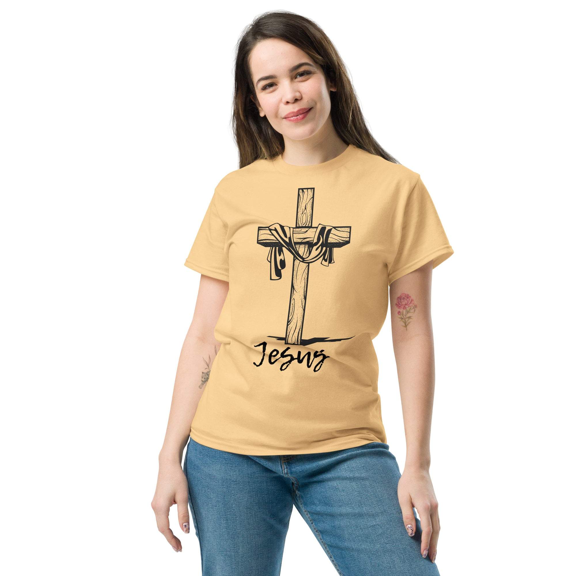 Woman wearing beige Christian Cross T-Shirt with Jesus graphic and inspirational design