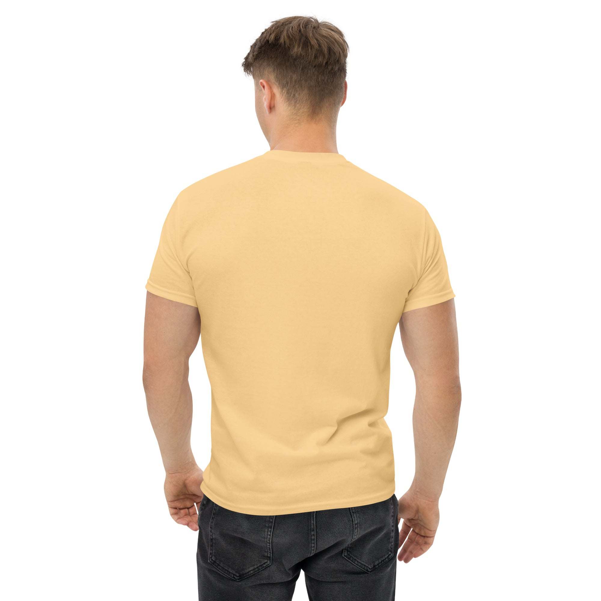 Back view of man wearing beige trendy graphic t-shirt in casual streetwear style