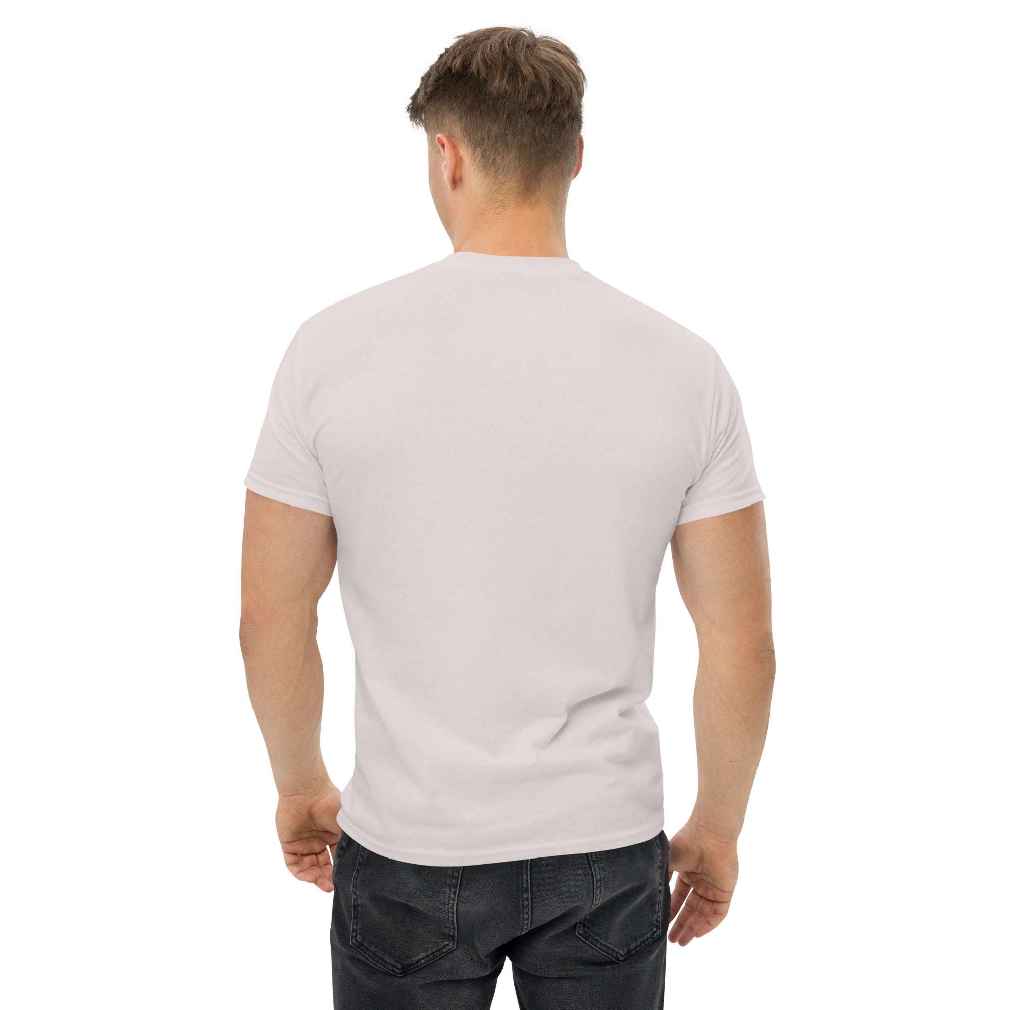 Back view of man wearing plain white trendy graphic t-shirt with short sleeves and black jeans