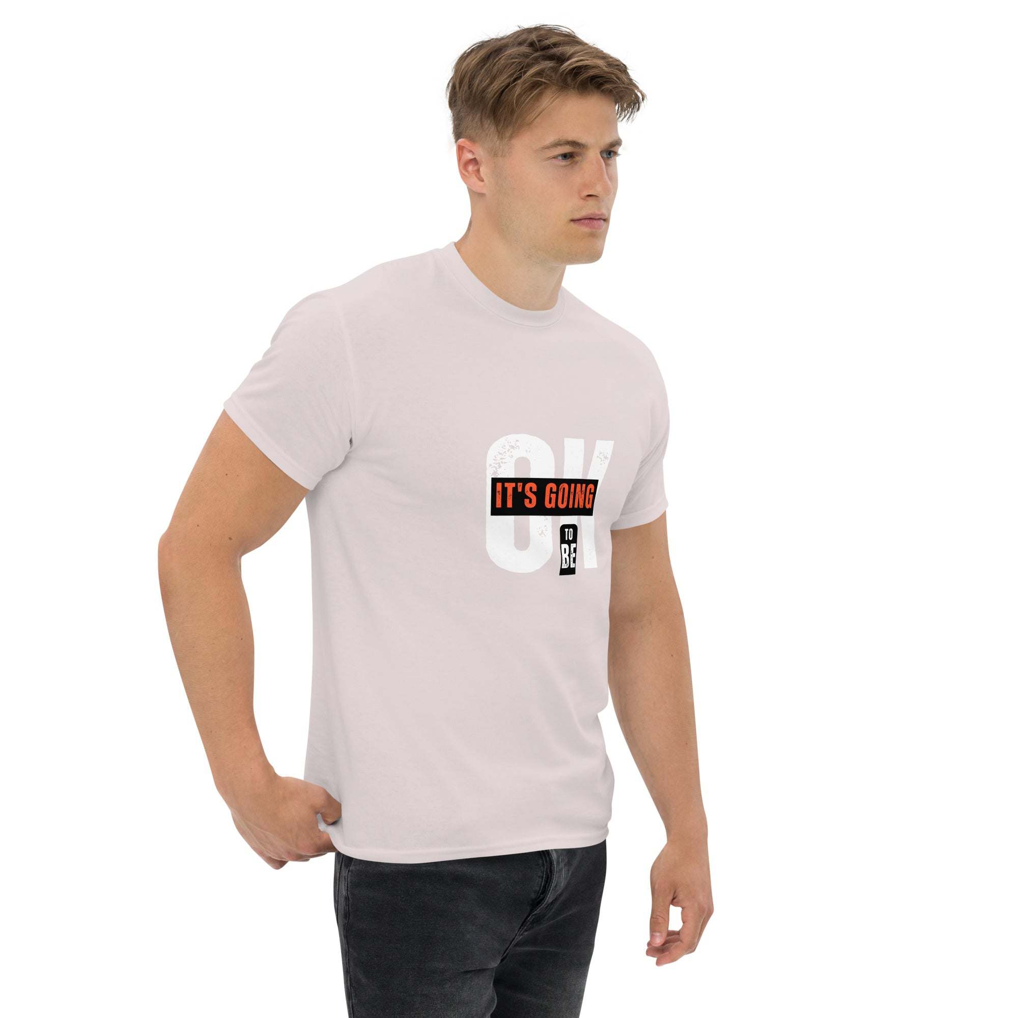 Man wearing trendy graphic t-shirt with motivational quote design in casual streetwear style