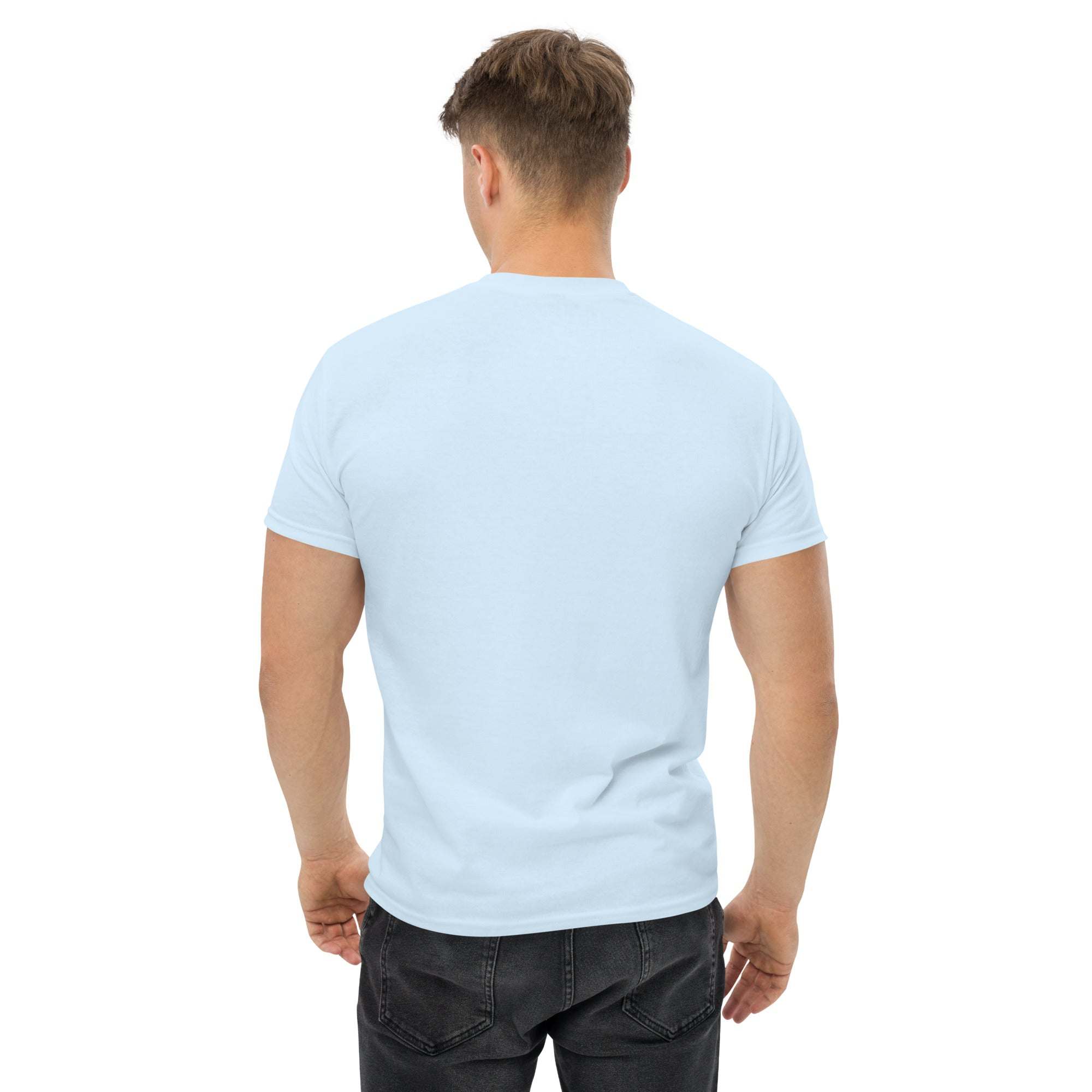 Back view of man wearing light blue trendy graphic t-shirt in casual street style