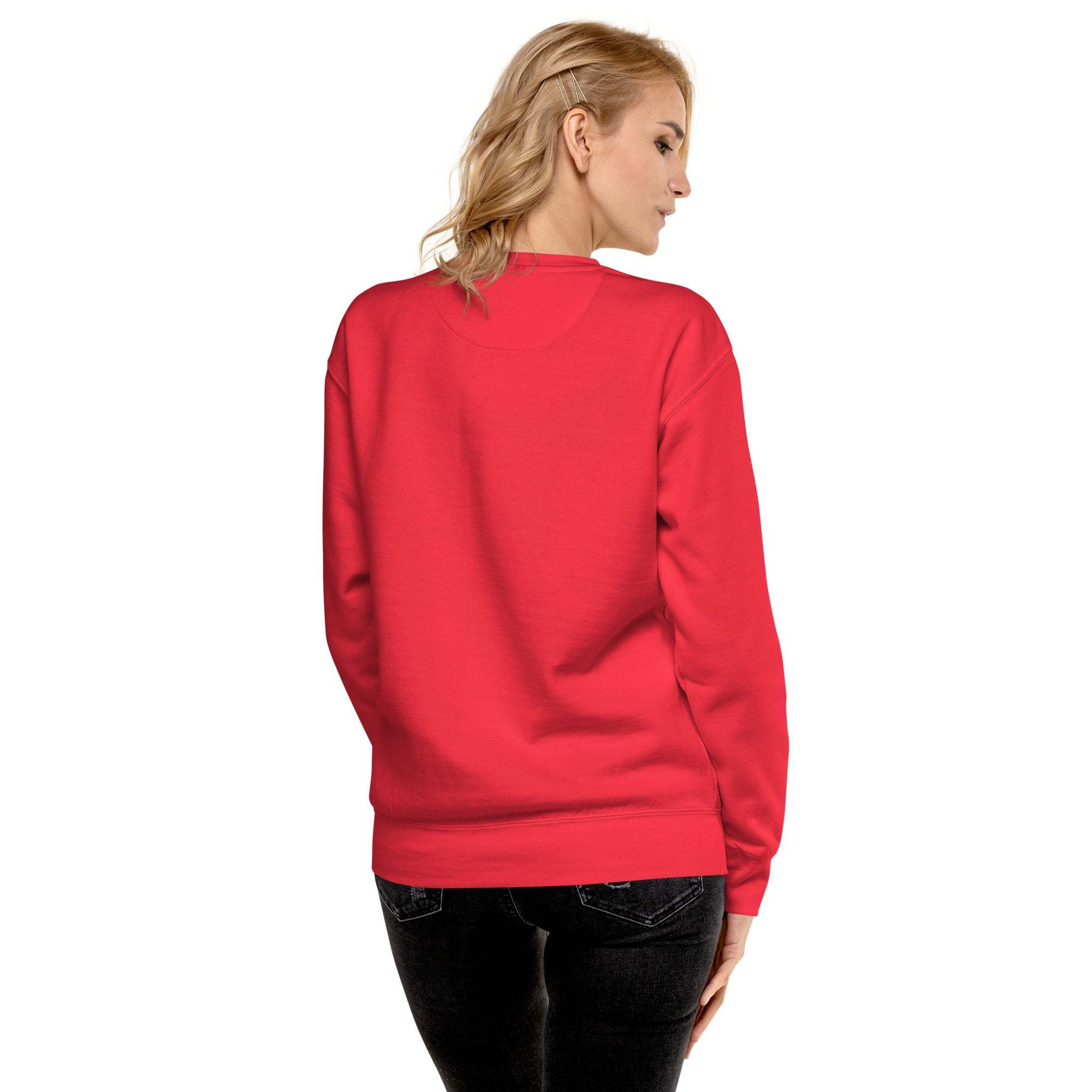 Woman wearing red Positive Sun Sweatshirt shown from the back with long sleeves and crewneck design