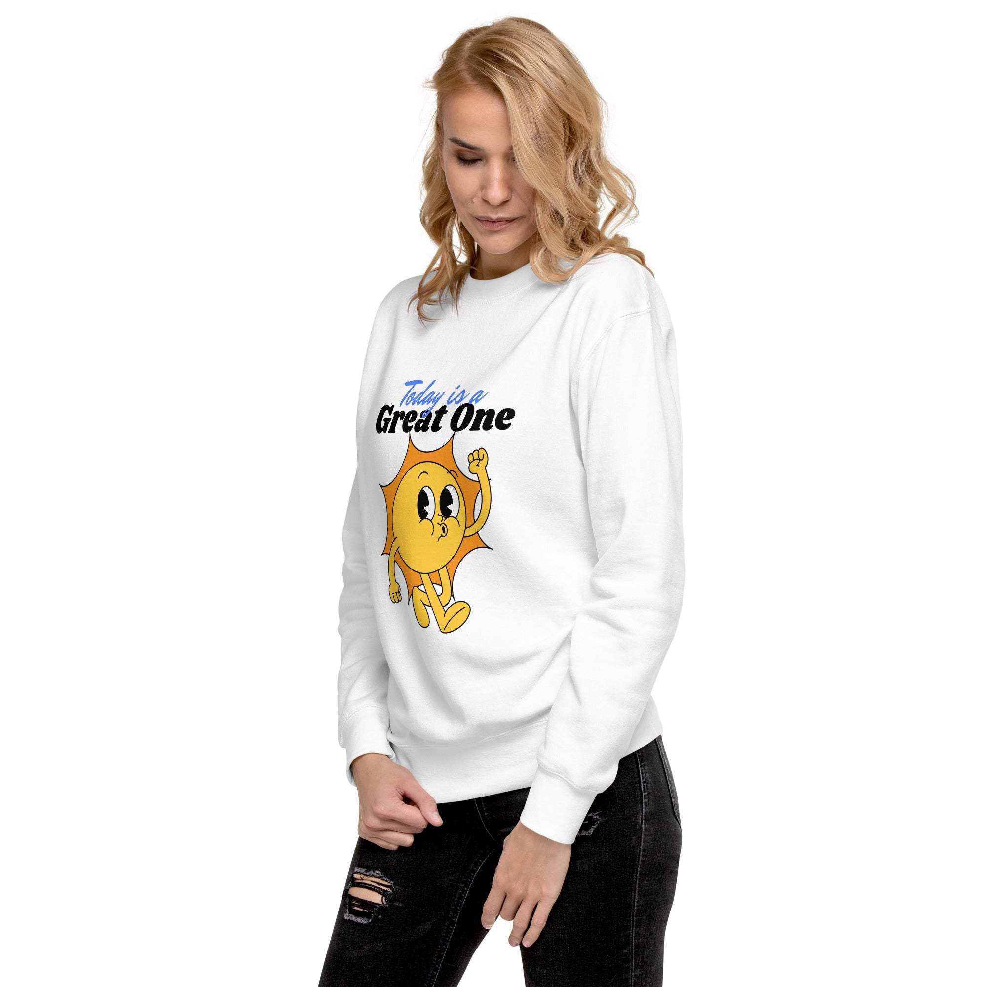 Woman wearing white Positive Sun Sweatshirt with cheerful sun graphic and motivational text "Today is a Great One"