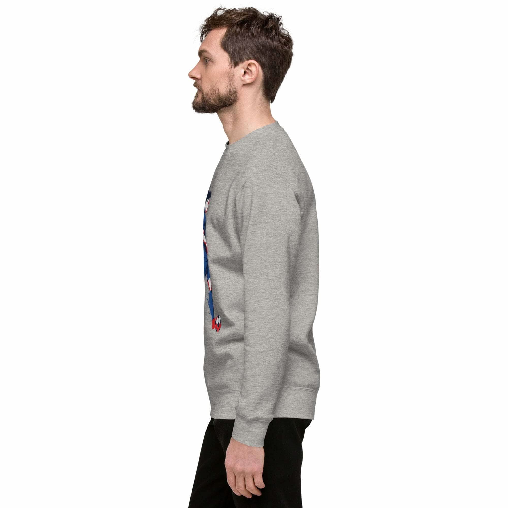 Side view of man wearing gray soccer player sweatshirt with sports graphic and crewneck design