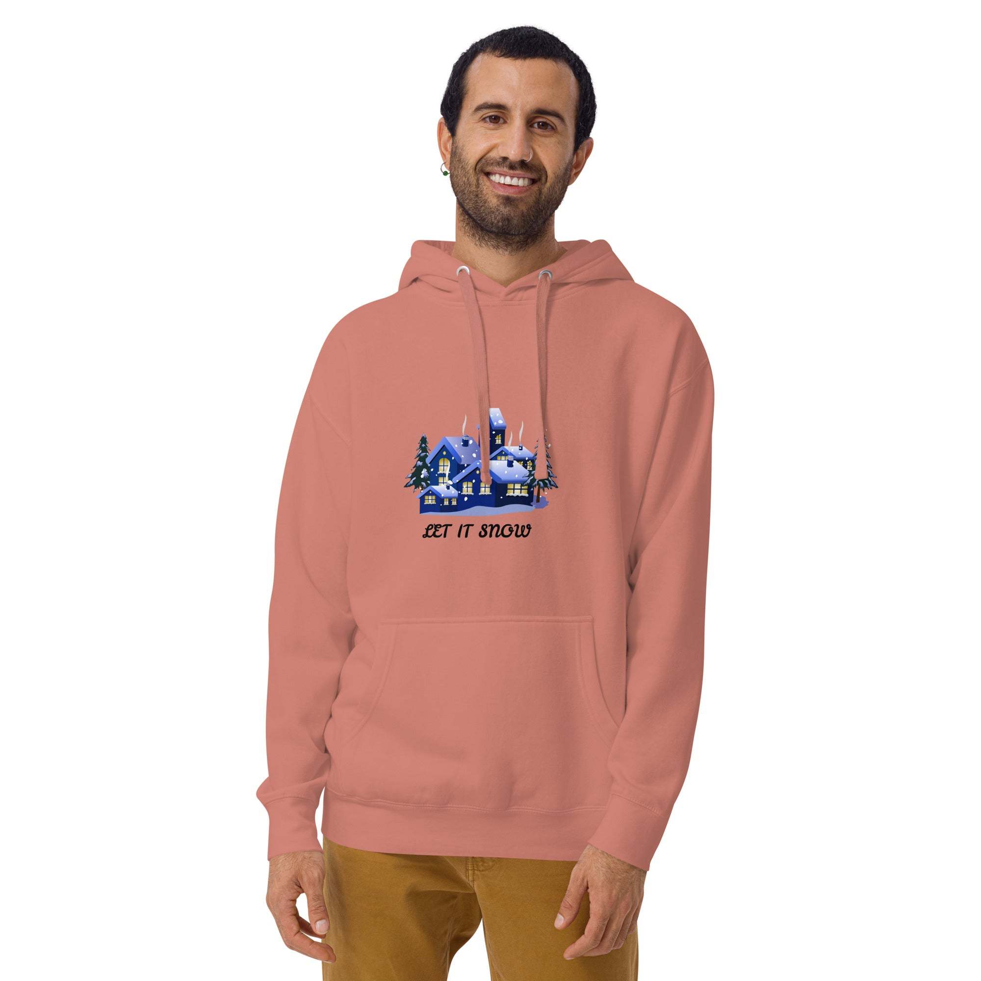 Man wearing a peach Let It Snow Hoodie with snowy village design and front pocket