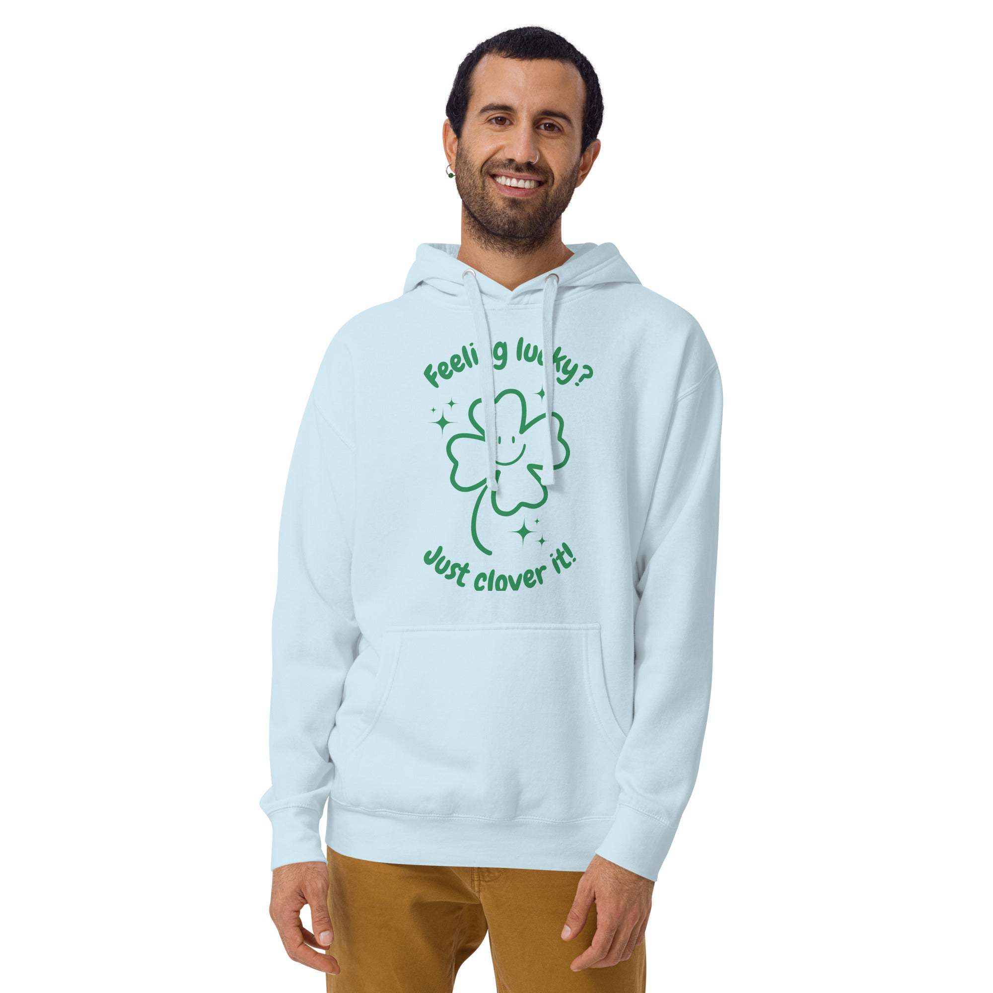 Man wearing light blue Lucky Clover Hoodie with green shamrock design and text "Feeling lucky? Just clover it!"