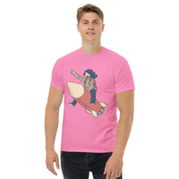 Man wearing pink Rocket Ride T-Shirt with retro cartoon anime girl riding a rocket graphic
