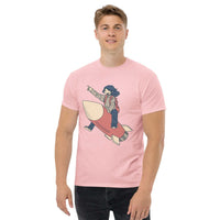 Man wearing pink Rocket Ride T-Shirt with retro cartoon rocket and astronaut design