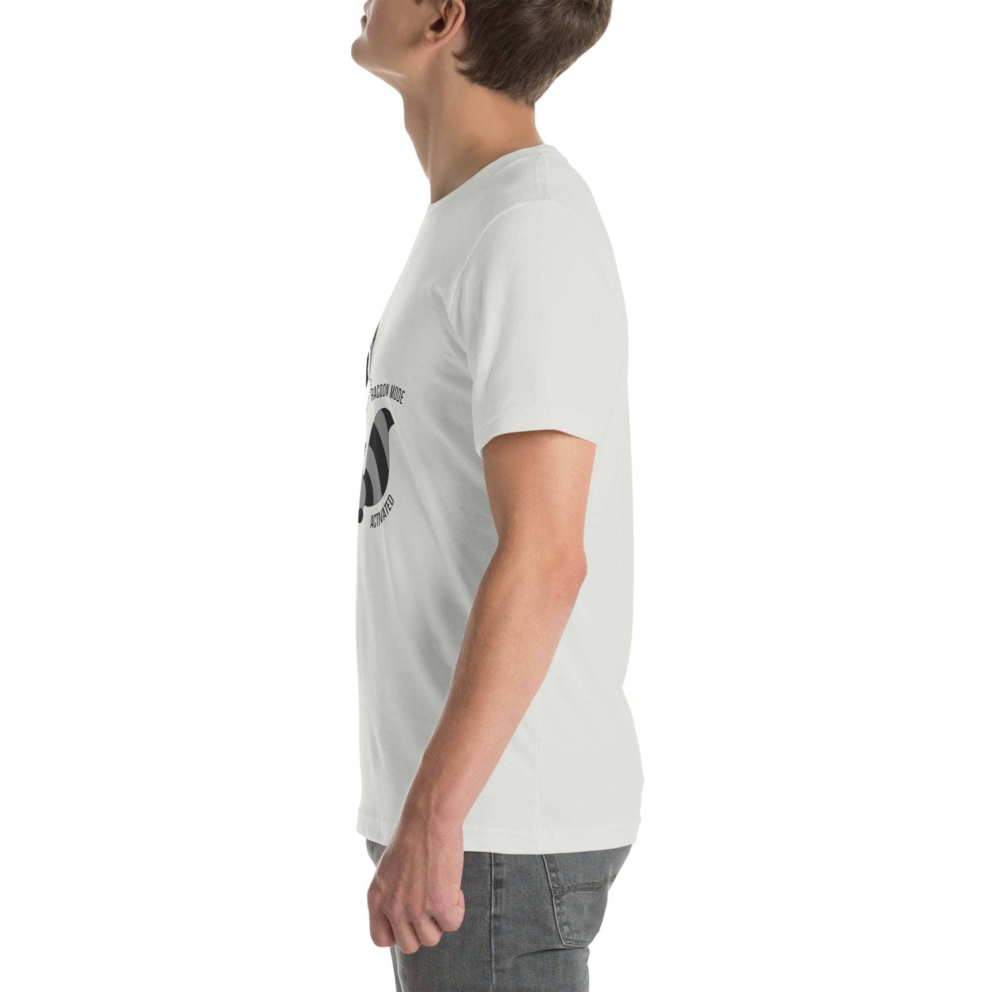 Side view of person wearing white Raccoon Mode T-Shirt with cartoon raccoon design and text.