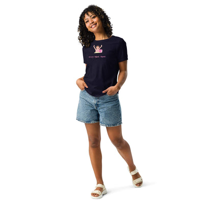 Woman wearing a navy Science Repeat Apparel T-Shirt with a playful science-themed design and light denim shorts